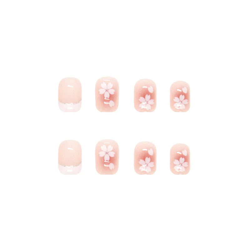 Set of 24 short square-shaped acrylic nails by LAQTA, showcasing neatly arranged false nail tips for manicures.