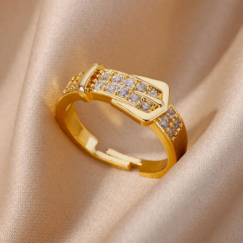 Elegant women's rings by LAQTA featuring intricate designs and silver finish, showcasing a close-up of the jewelry.