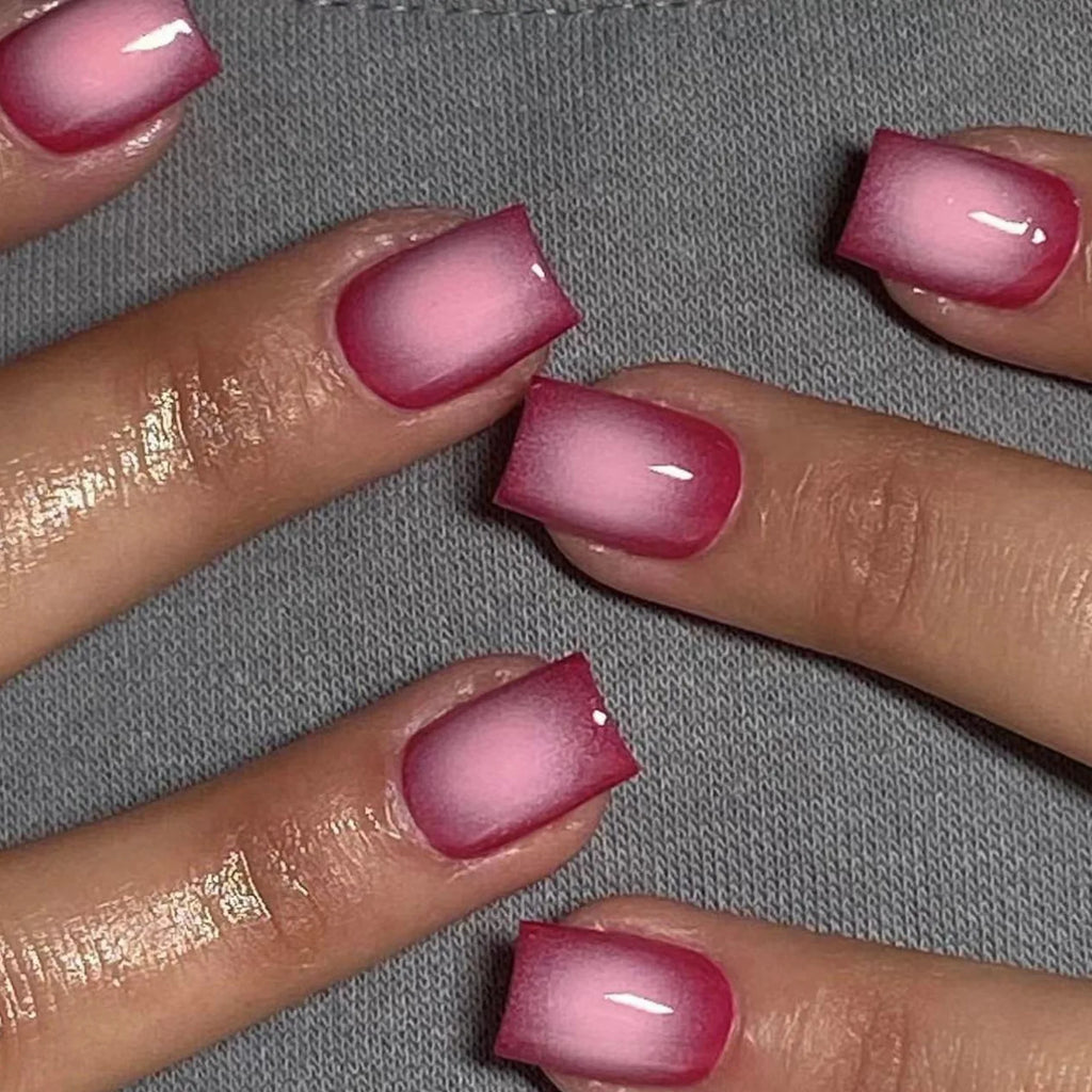 Set of 24 short square acrylic nails in various styles by LAQTA, arranged on a white background for nail art or design use.