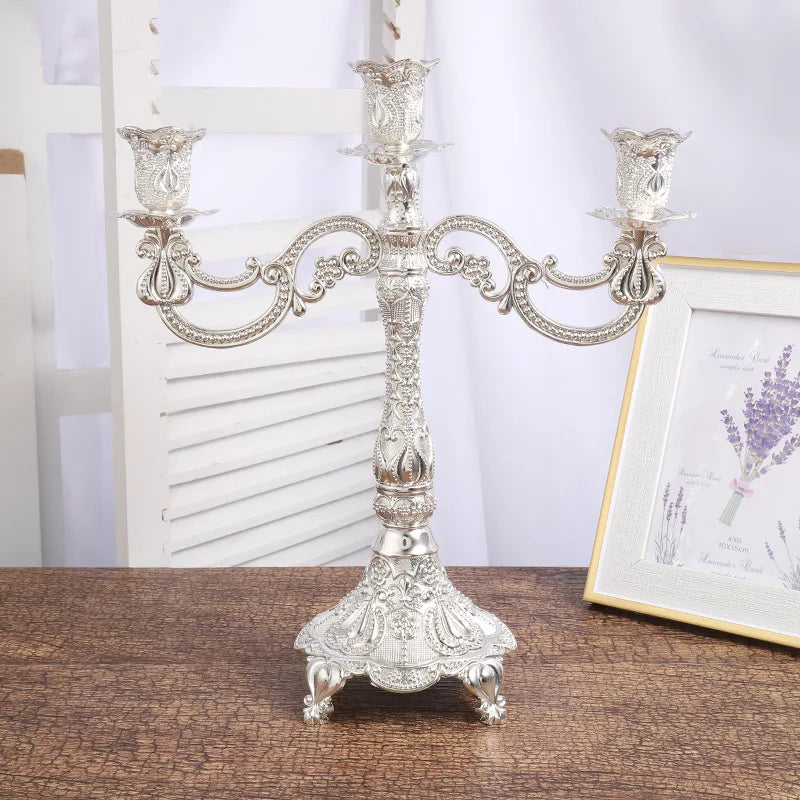 Elegant LAQTA candle holders for decor, featuring stylish metal design perfect for enhancing home ambiance.