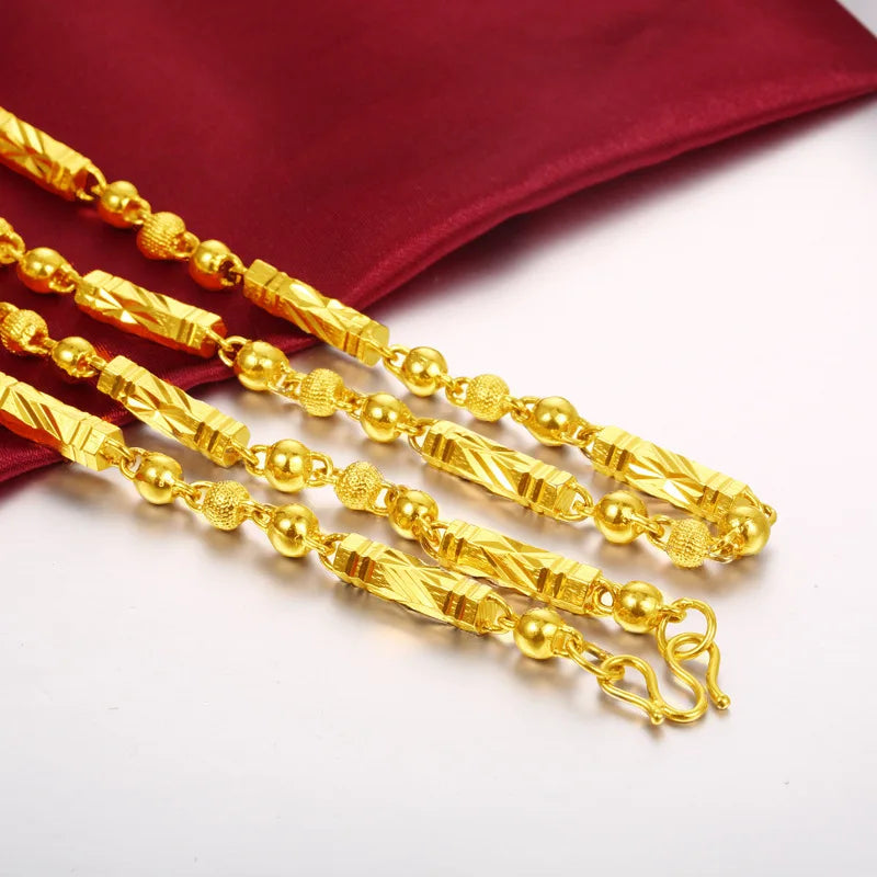 Electroplated 18K gold necklace by LAQTA featuring a sleek, elegant chain design displayed against a neutral background.