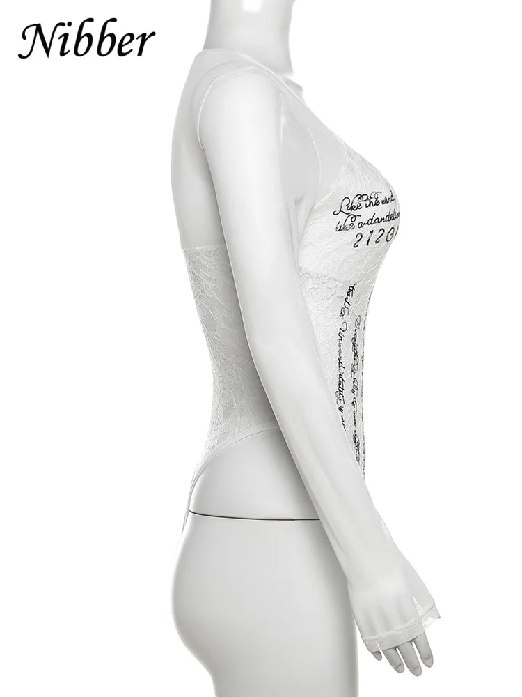 Woman wearing a letter print bodysuit by LAQTA, featuring a fitted design and stylish letter graphics.