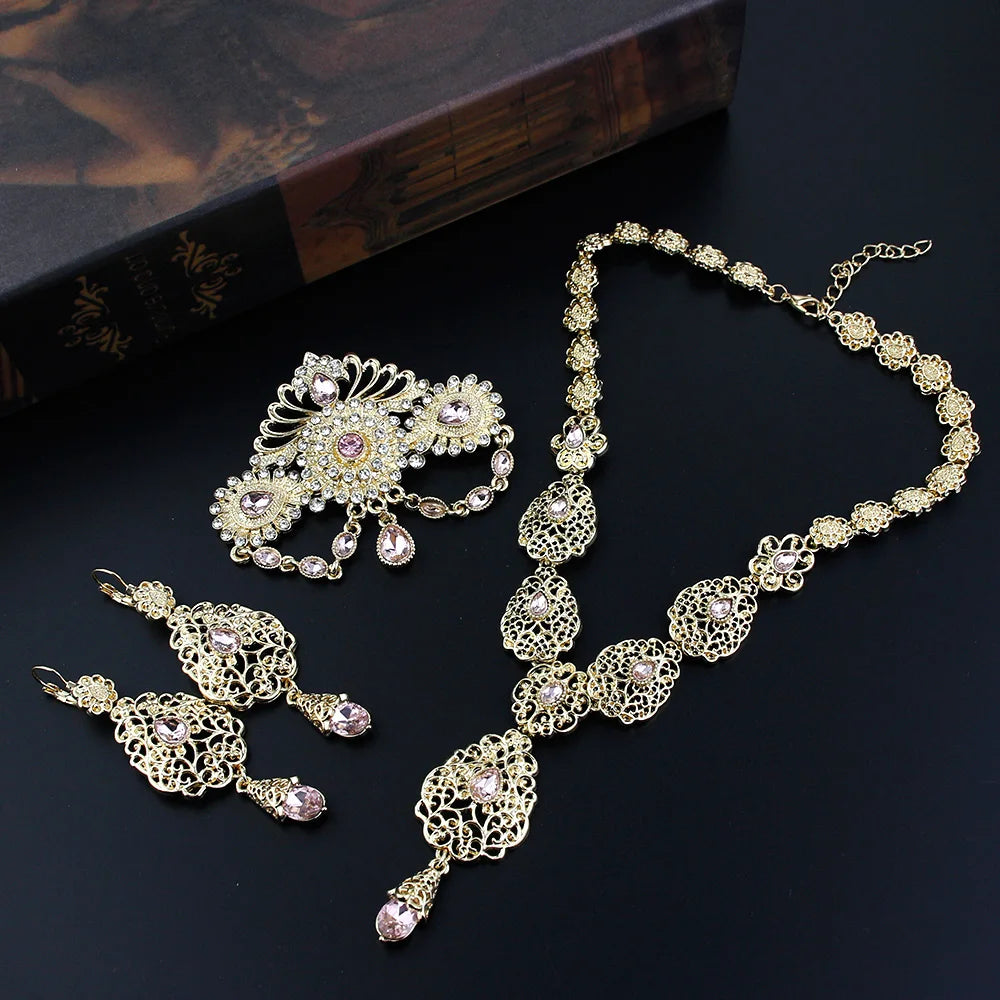 Elegant Morocco bride jewelry by LAQTA, featuring intricate silver and gemstone adornments for traditional wedding attire.