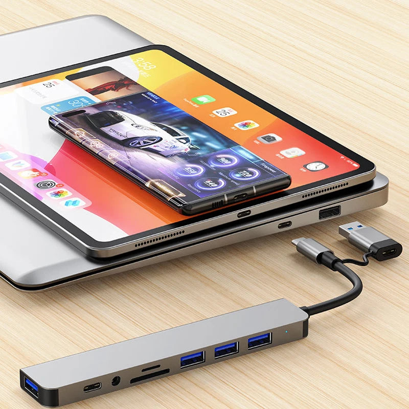 LAQTA 8-in-1 USB and Type C hub docking station with multiple ports for connecting peripherals and expanding device connectivity.