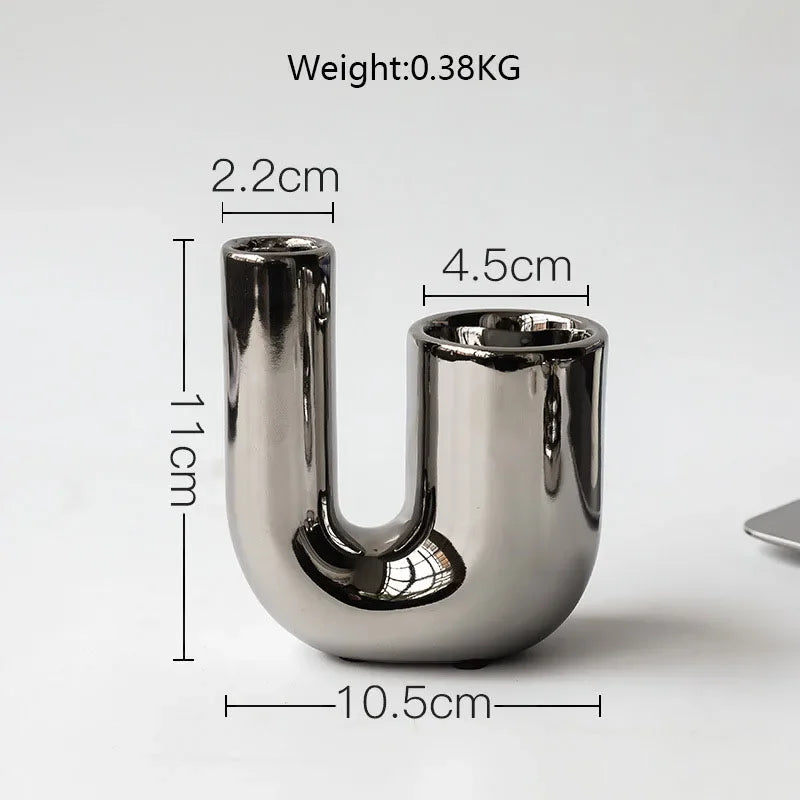 Luxury electroplating silver geometric ceramic candlestick by LAQTA, showcasing a modern design with sleek metallic and ceramic finish.