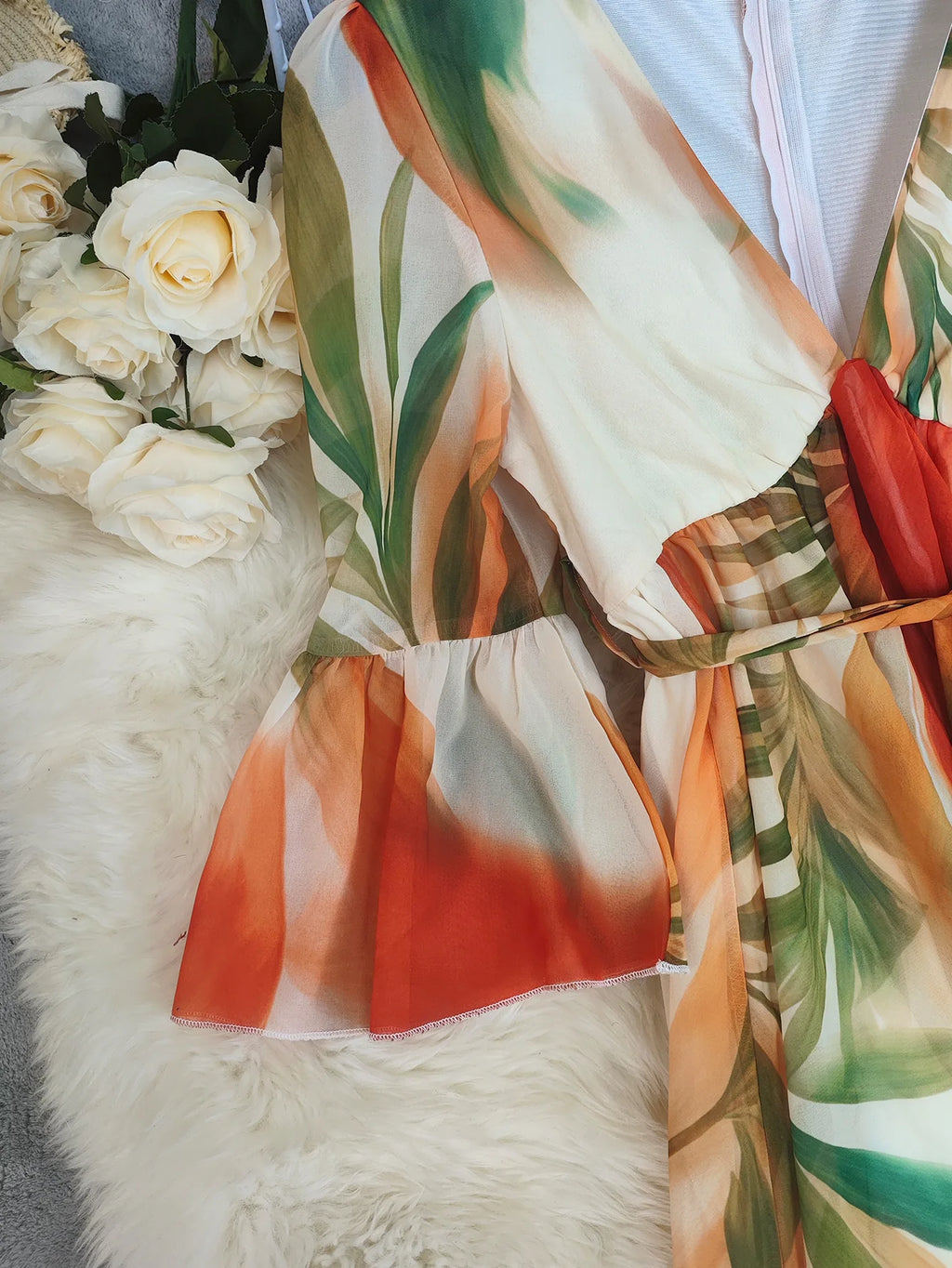 Elegant long women's dress by LAQTA featuring flowing fabric and a stylish silhouette for sophisticated occasions.