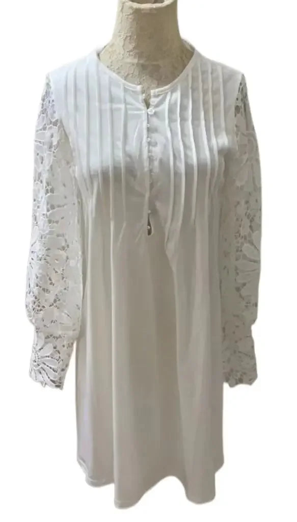 Elegant summer dress by LAQTA featuring lightweight fabric, sleeveless design, and floral pattern perfect for warm weather.