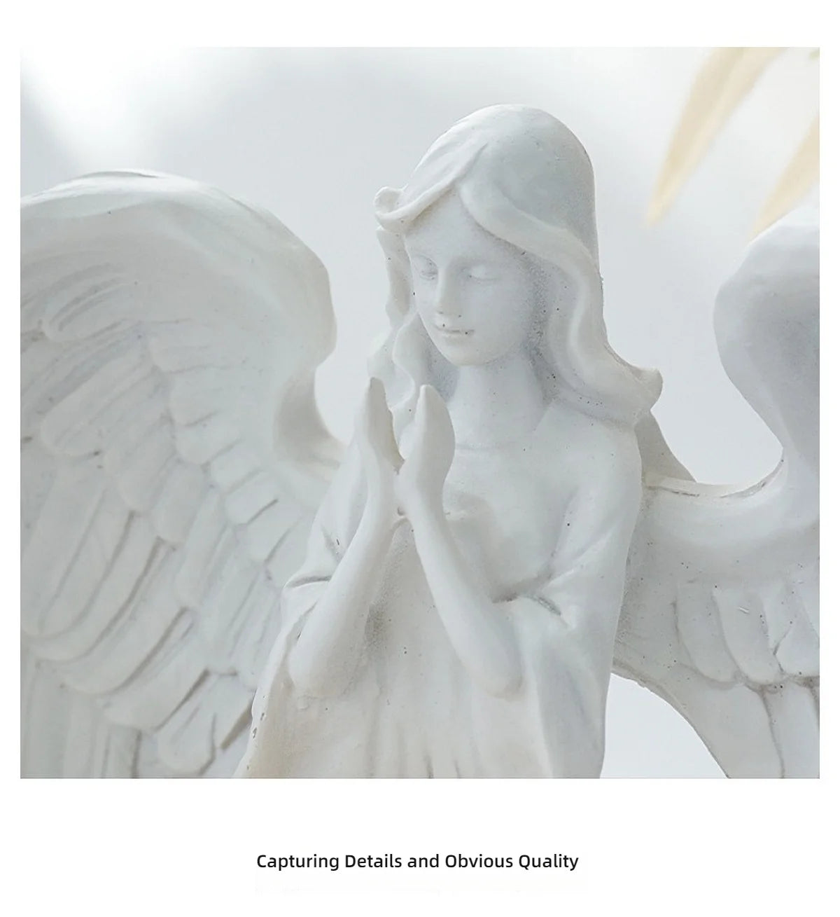 White angel candle holder by LAQTA featuring a detailed angel design and a wide base for stability.