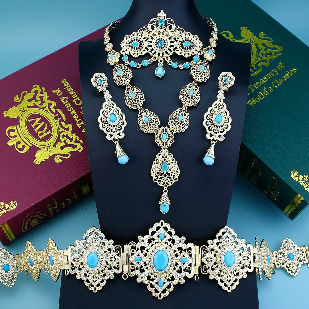 Elegant Arabic bride jewelry set by LAQTA featuring intricate gold and gemstone adornments with matching earrings and necklace.