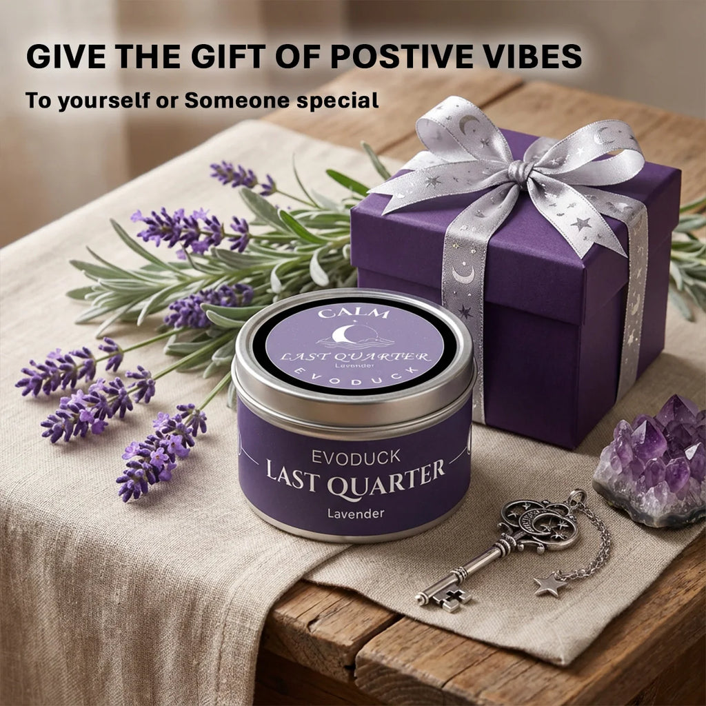 LAQTA Waning Moon scented candle in a glass jar, featuring a crescent moon design and a soft, warm glow.
