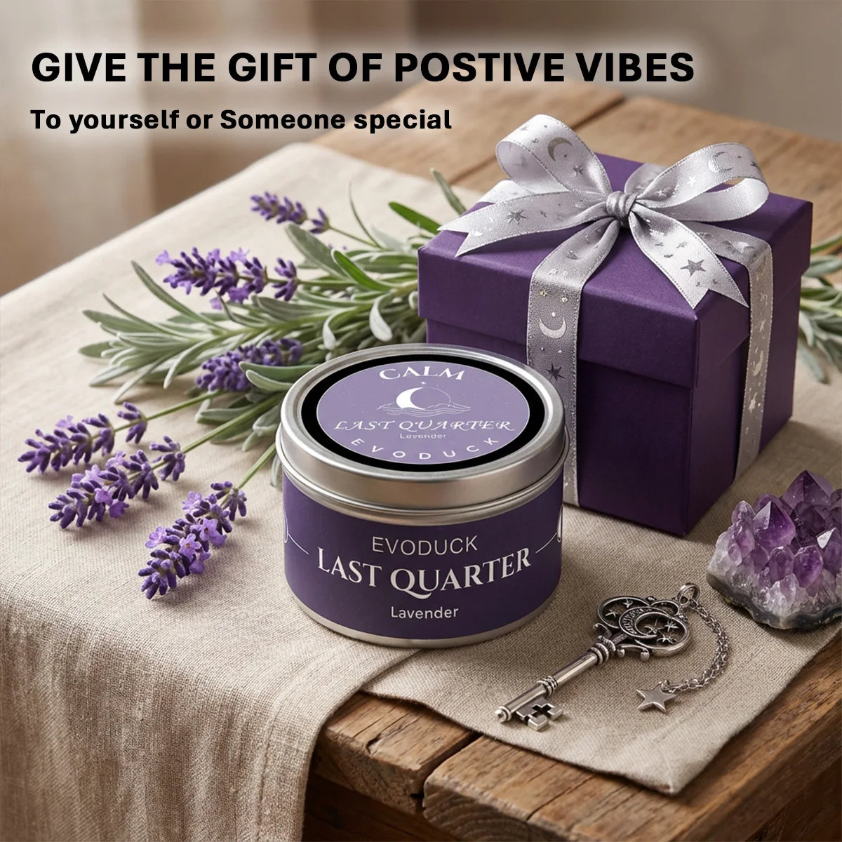 LAQTA Waning Moon scented candle in a glass jar, featuring a crescent moon design and a soft, warm glow.