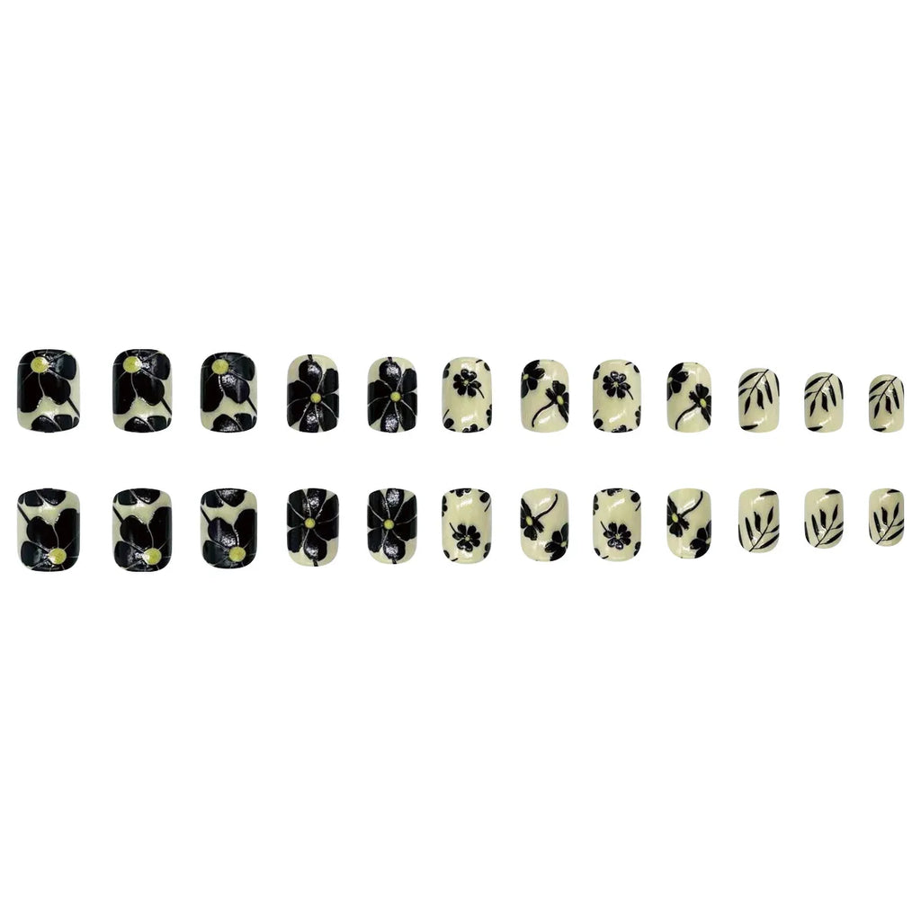 Short square fake nails by LAQTA with a sleek, natural finish, displayed on a neutral background.