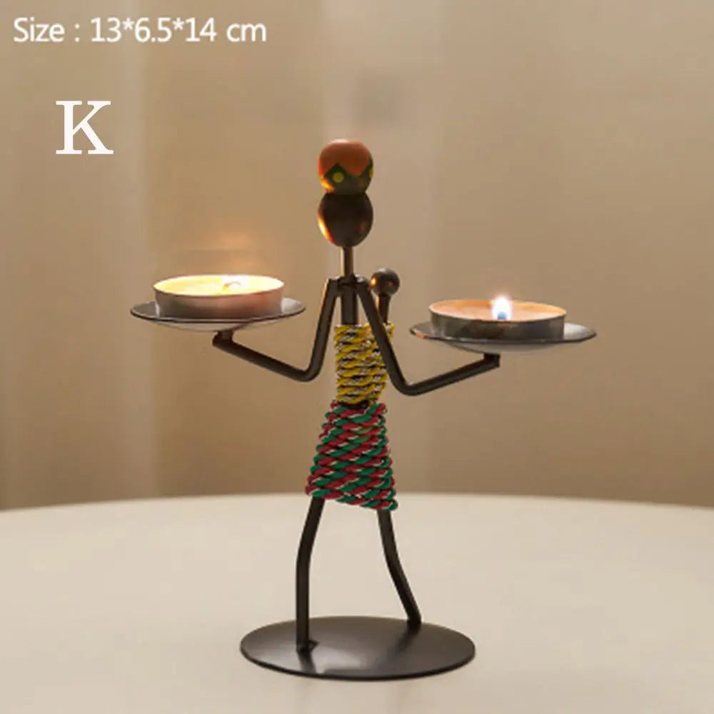 Nordic metal candlestick by LAQTA featuring a sleek, modern design with a sturdy base and a tall, elegant candle holder.