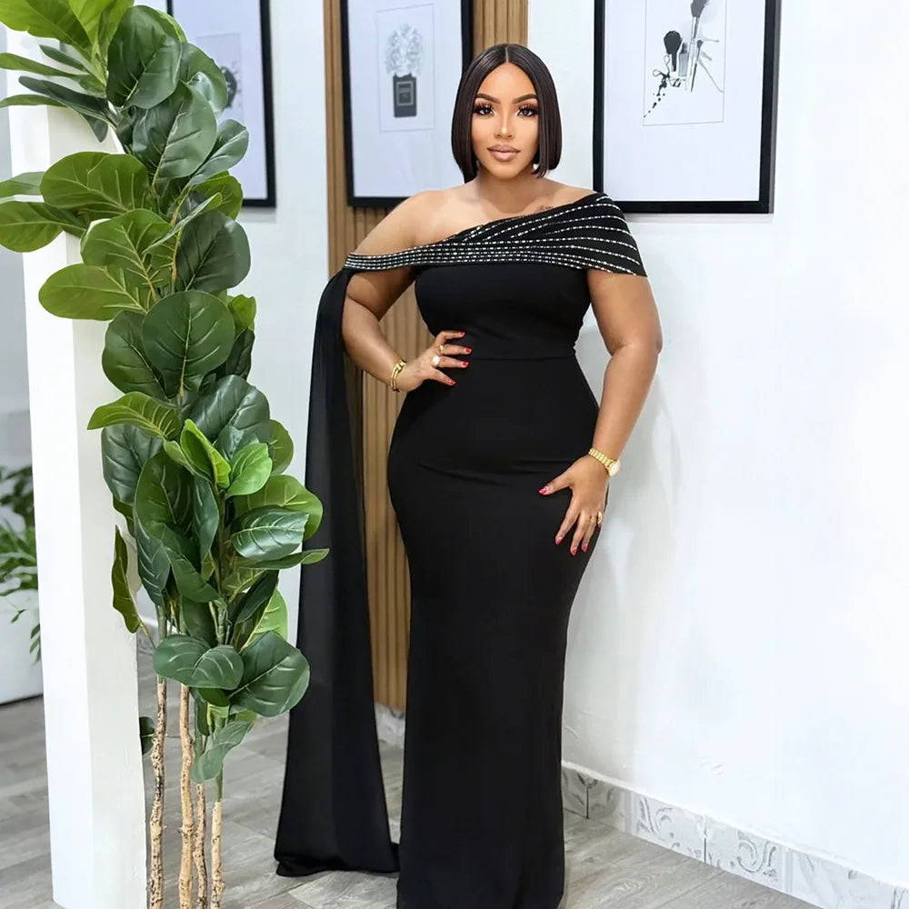 LAQTA sexy rhinestone patchwork bodycon long dress featuring shimmering embellishments and a fitted silhouette.