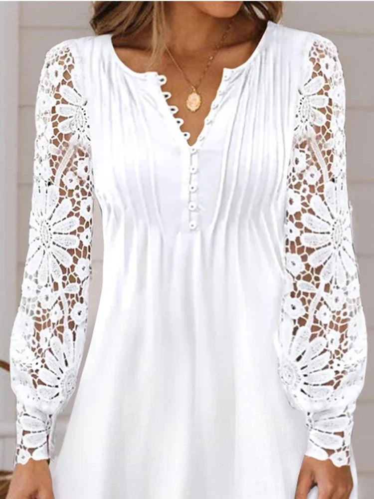 Elegant summer dress by LAQTA featuring lightweight fabric, sleeveless design, and floral pattern perfect for warm weather.