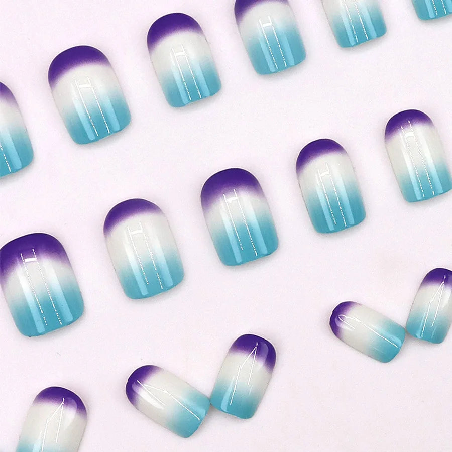 Short square fake nails by LAQTA, neatly arranged on a white background, showcasing their smooth, glossy finish and natural shape.