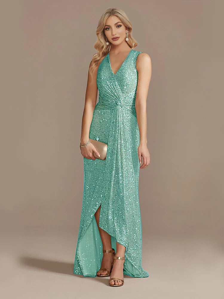 Elegant evening dress by LAQTA featuring a sleek silhouette, stylish neckline, and flowing fabric perfect for formal occasions.