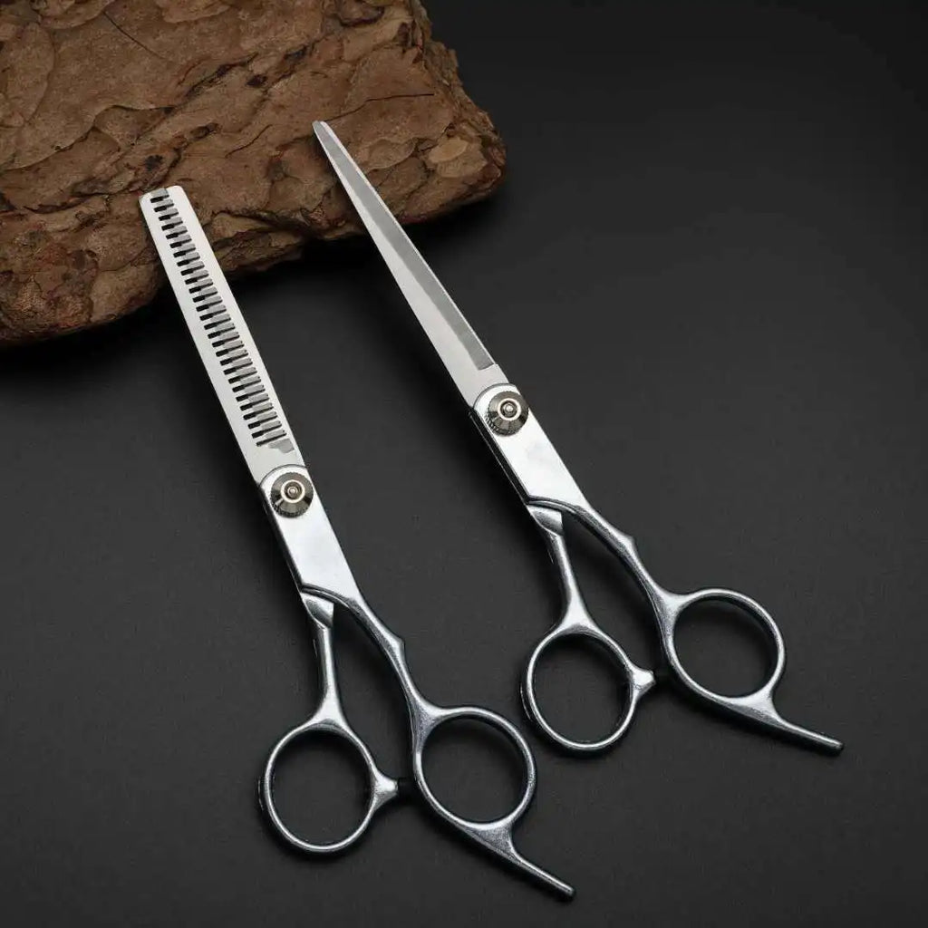 Professional LAQTA barber scissors with sharp blades and ergonomic handles for precise hair cutting and styling.