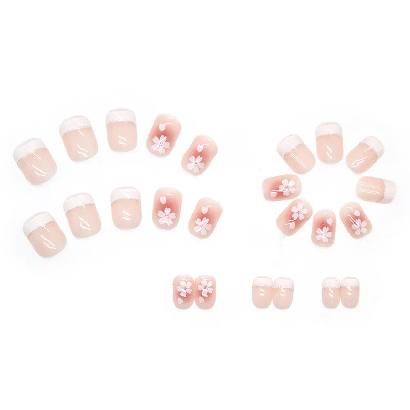 Set of 24 short saucer nails from LAQTA, showcasing neatly arranged, glossy, natural-looking nail tips for manicure embellishments.