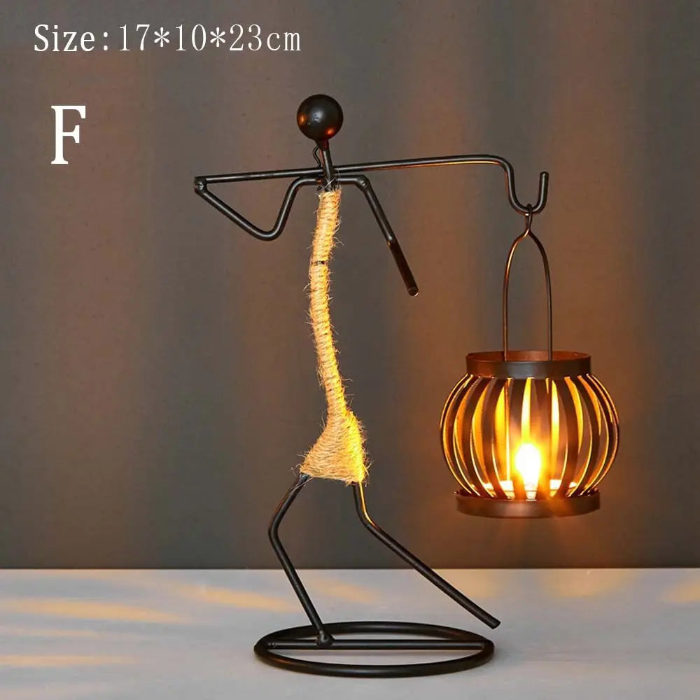 Nordic metal candlestick by LAQTA, featuring a sleek, minimalist design with a tall, cylindrical shape and a sturdy base.