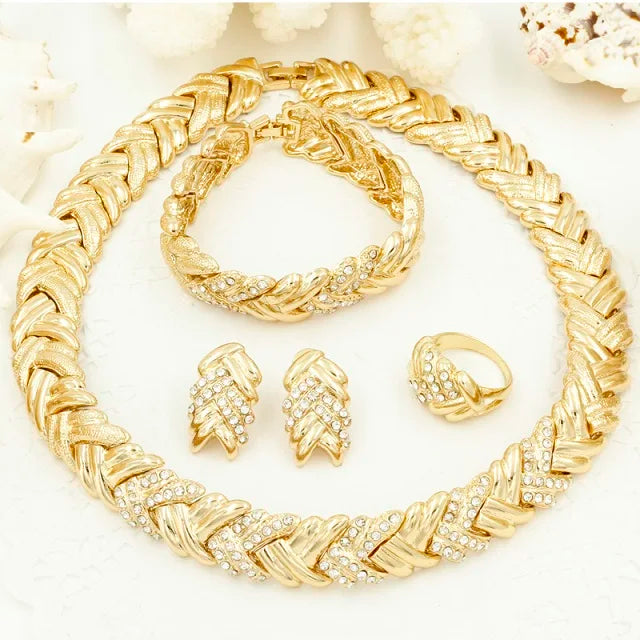 Gold-colored bridal fashion jewelry by LAQTA, featuring intricate designs and elegant craftsmanship for Dubai wedding styles.