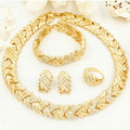 Gold-colored bridal fashion jewelry by LAQTA, featuring intricate designs and elegant craftsmanship for Dubai wedding styles.