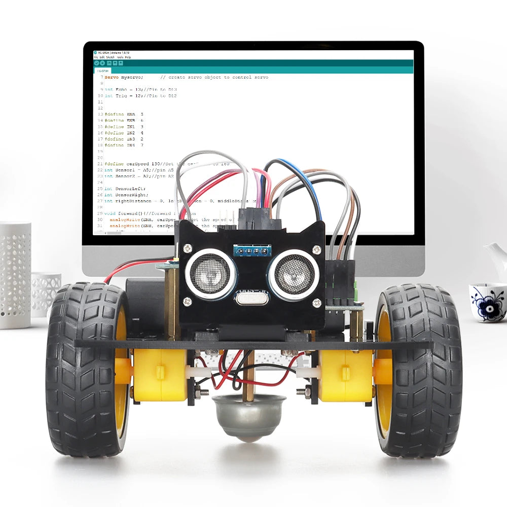 LAQTA Smart Starter Robot Kit featuring assembled robot with sensors and electronic components on a white background.