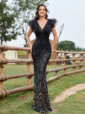 Elegant black evening dress by LAQTA featuring a fitted silhouette and stylish design, perfect for formal occasions.