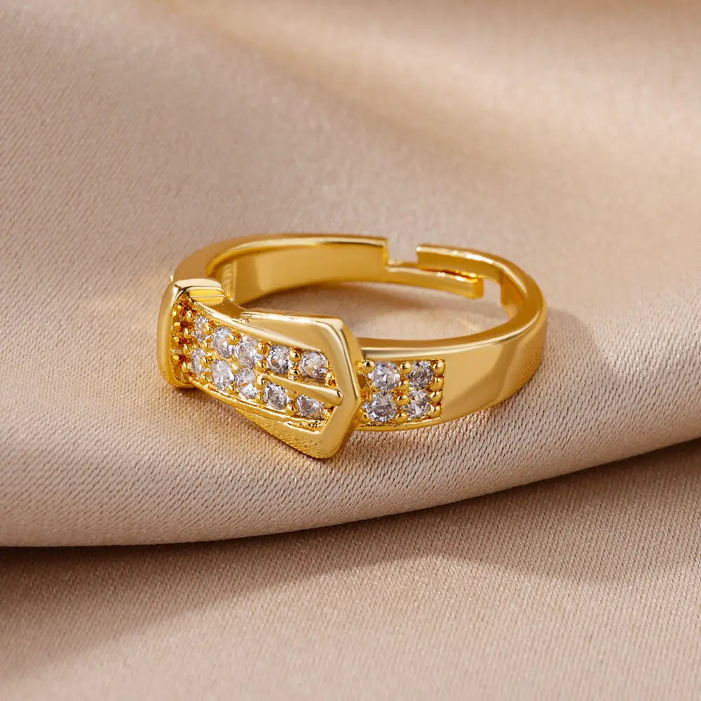 Elegant women's rings by LAQTA featuring multiple silver bands with intricate designs and sparkling accents.