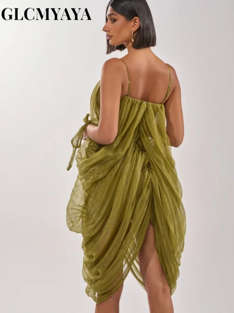 LAQTA sheer mesh dress with draped design and plunging neckline, showcasing elegant, lightweight fabric and stylish silhouette.