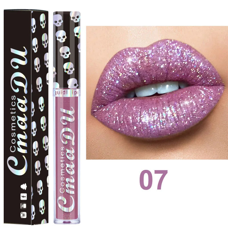 LAQTA Honey Gloss Lipstick lip gloss tube with shiny golden cap and honey-toned gloss inside, close-up shot