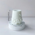 LAQTA Nordic Floral Scented Candle in a decorative glass jar with floral design and warm candlelight.