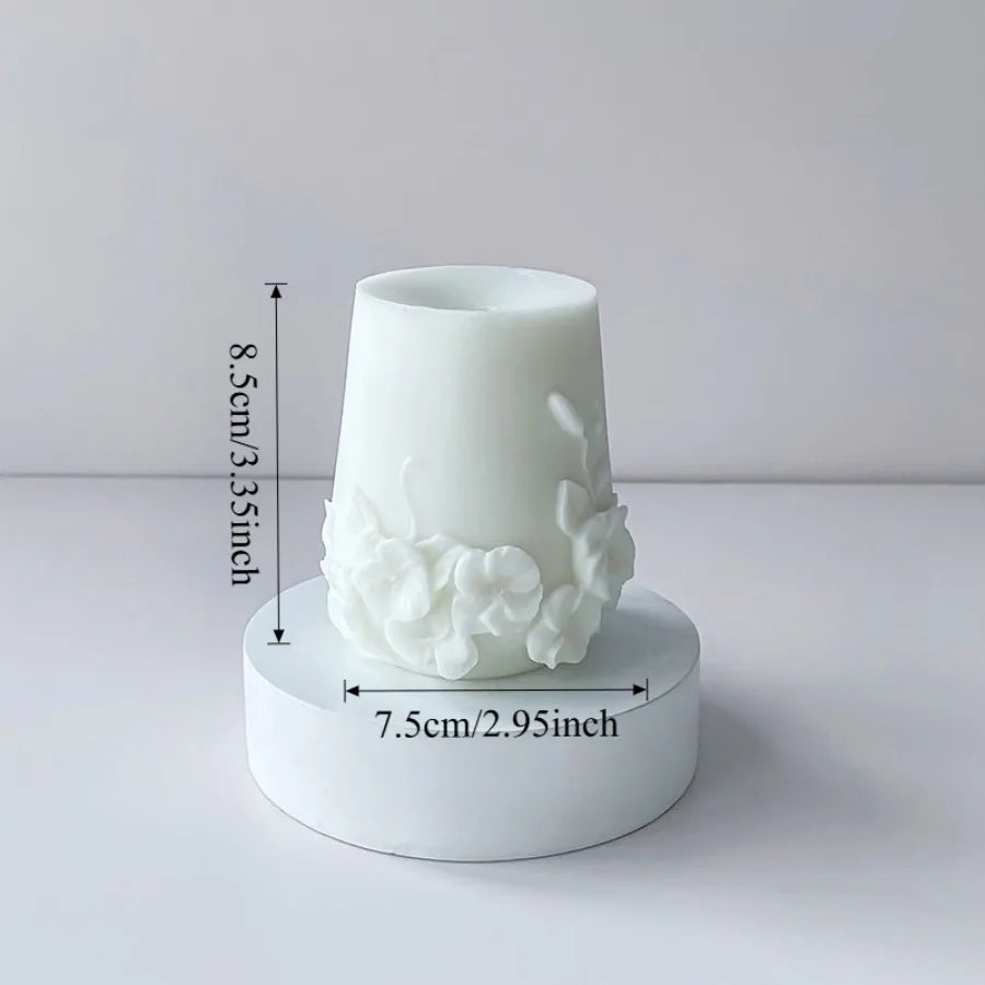 LAQTA Nordic Floral Scented Candle in a decorative glass jar with floral design and warm candlelight.