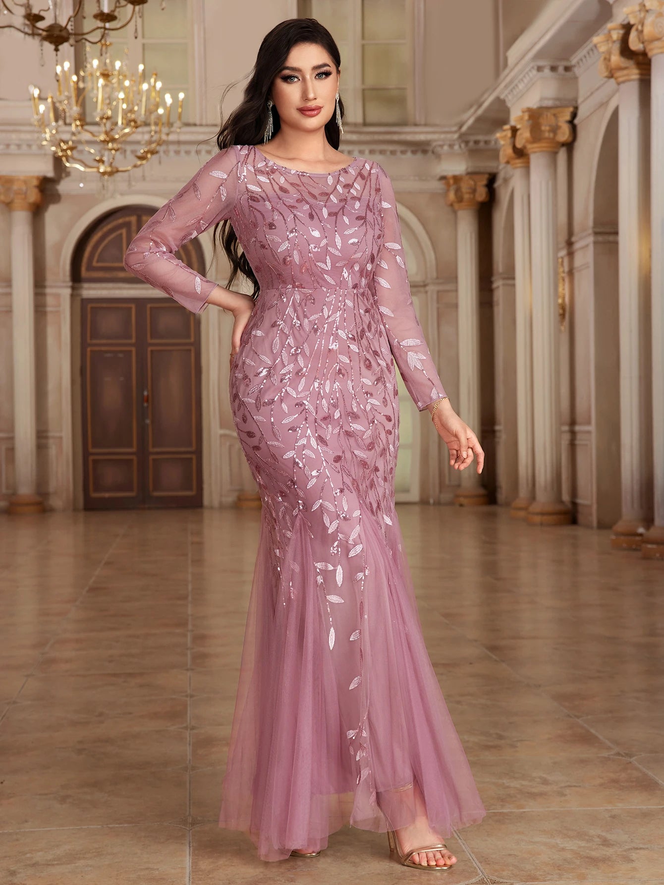 Elegant mermaid evening dress by LAQTA featuring shimmering fabric and intricate design, perfect for formal occasions.
