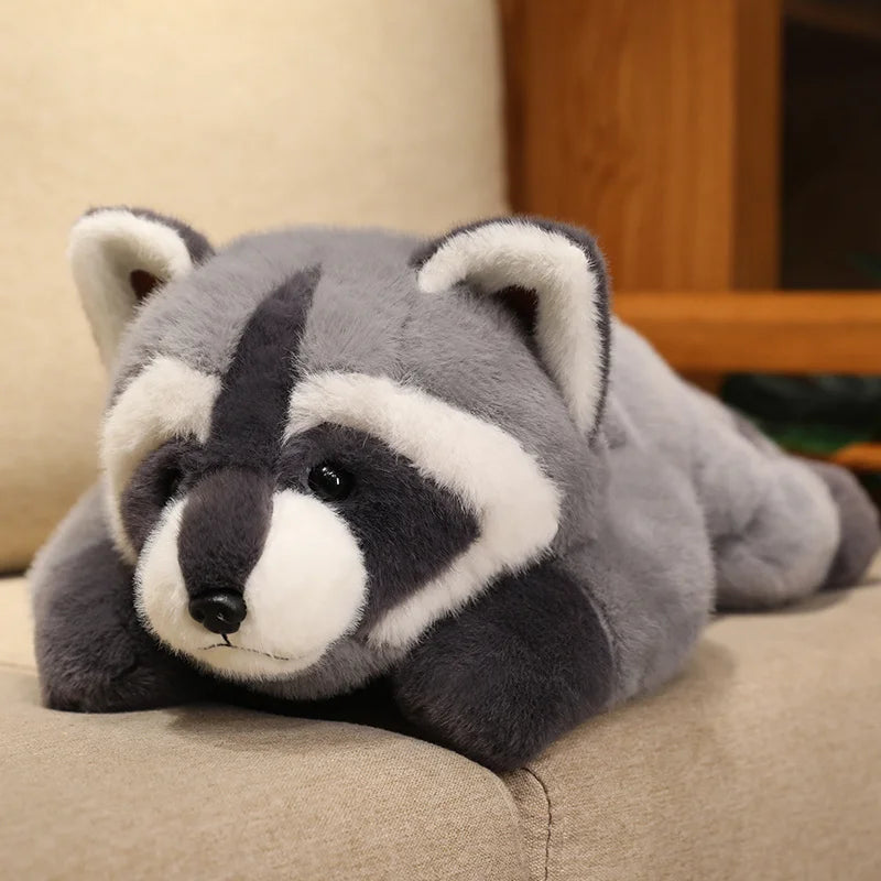 Soft Kawaii raccoon plush toy by LAQTA with adorable facial features and fluffy gray and white fur, perfect for cuddling.