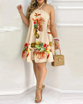 Floral print halter neck top by LAQTA featuring a vibrant pattern and stylish design, shown on a mannequin.