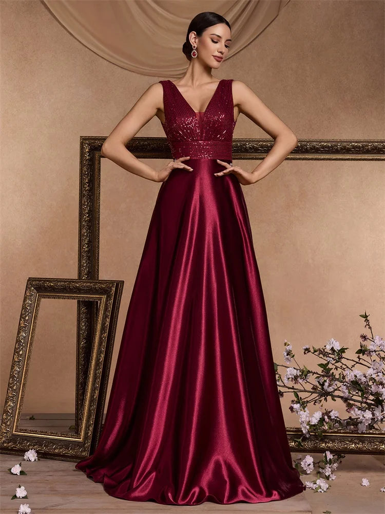 Elegant sequins evening dress by LAQTA featuring a fitted silhouette and shimmering embellishments.