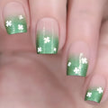 Set of 24 short Saur nails from LAQTA, showcasing neatly arranged nail tips with a natural finish and modern design.