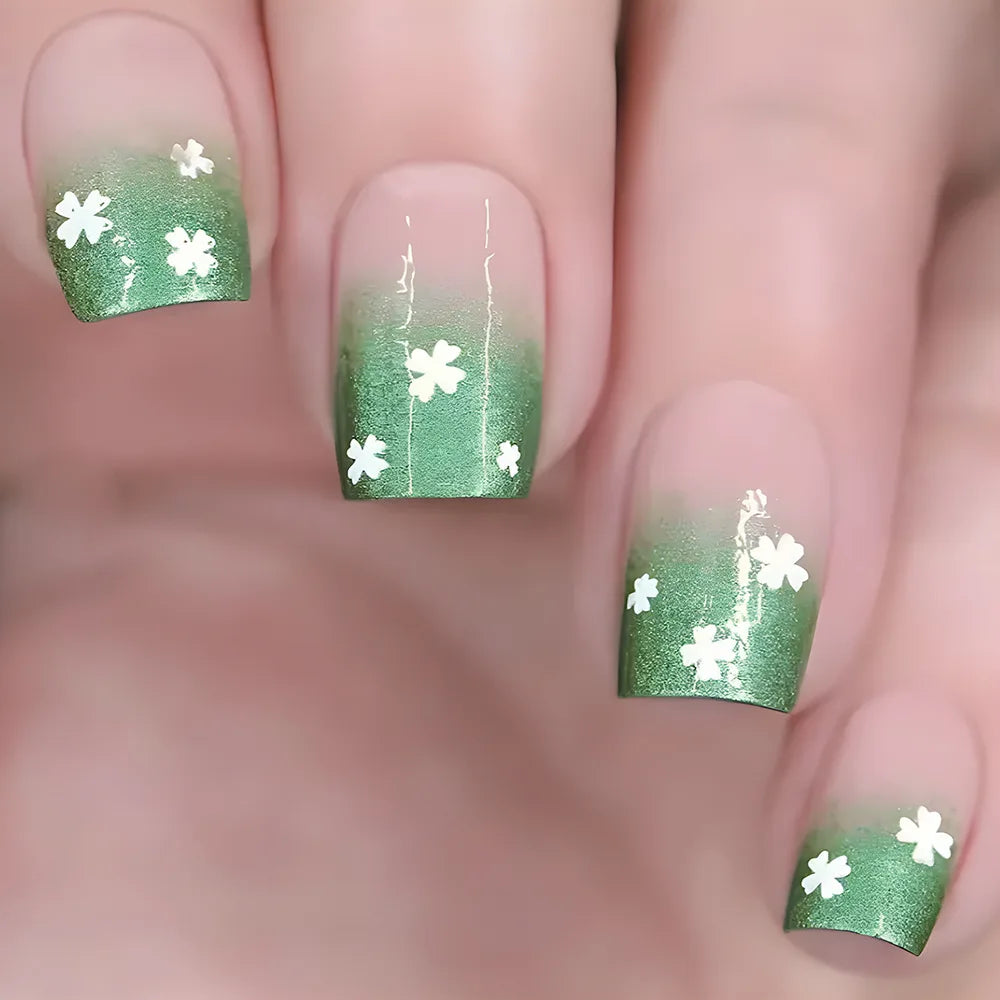 Set of 24 short Saur nails from LAQTA, showcasing neatly arranged nail tips with a natural finish and modern design.