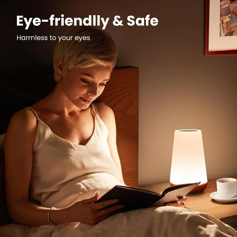 Dimmable LAQTA touch lamp with sleek modern design, featuring a smooth touch control surface and warm ambient lighting.