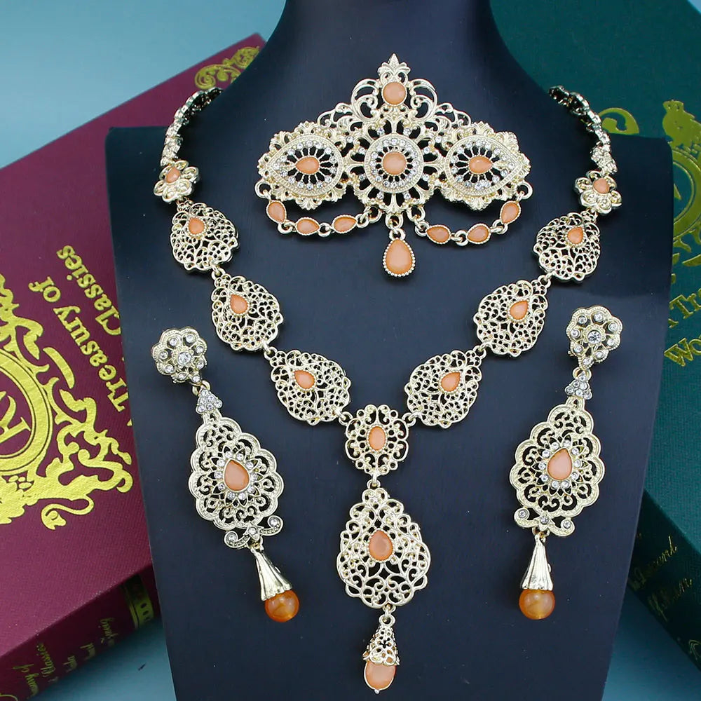 Elegant Arabic bride jewelry set by LAQTA featuring intricate gold and gemstone embellishments for traditional wedding attire.