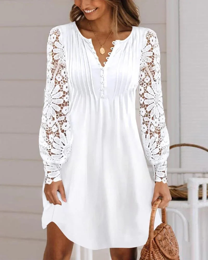 Elegant summer dress by LAQTA featuring lightweight fabric, floral pattern, and flowing design perfect for warm weather.