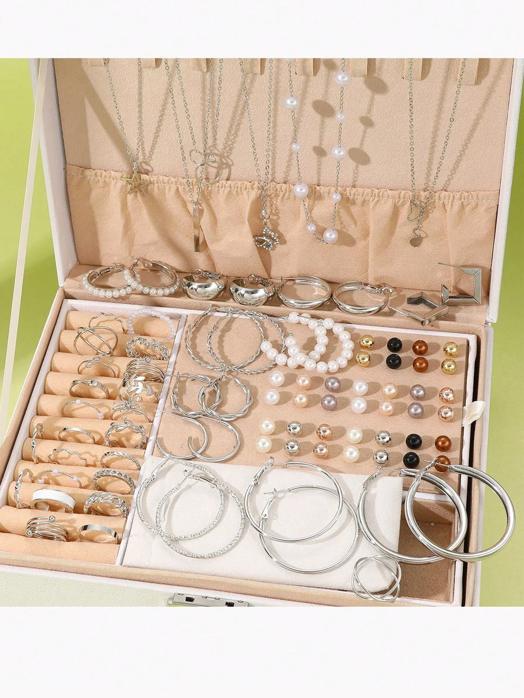 Elegant multi-pearl earrings by LAQTA featuring layered pearl designs with gold accents, showcased on a white background.