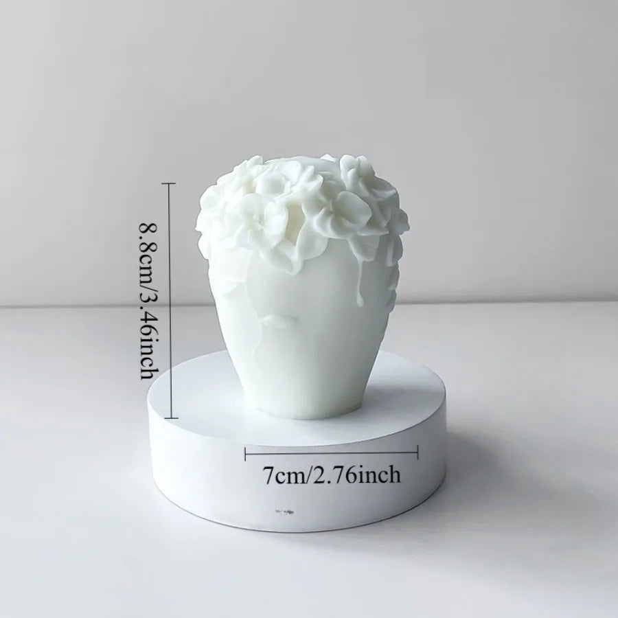 Decorative Nordic floral scented candle by LAQTA in a glass jar with a floral design, ideal for cozy home ambiance.