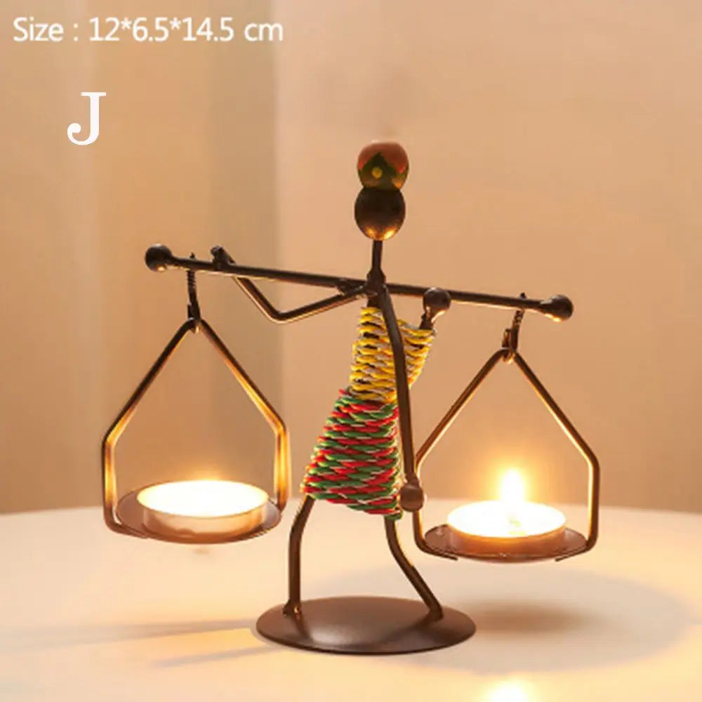 Nordic metal candlestick by LAQTA featuring a sleek, modern design with a tall, slender shape and a sturdy base for holding candles.