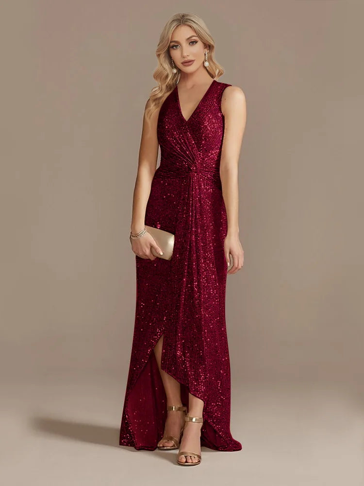 Elegant evening dress by LAQTA featuring a flowing fabric and intricate design, perfect for formal events.