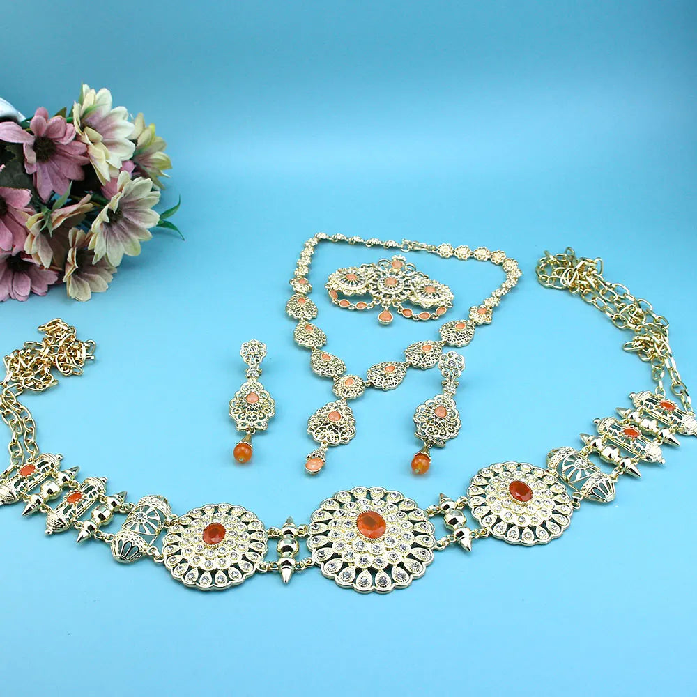 Elegant Arabic bride jewelry set by LAQTA featuring intricate gold and gemstone details for traditional wedding attire.
