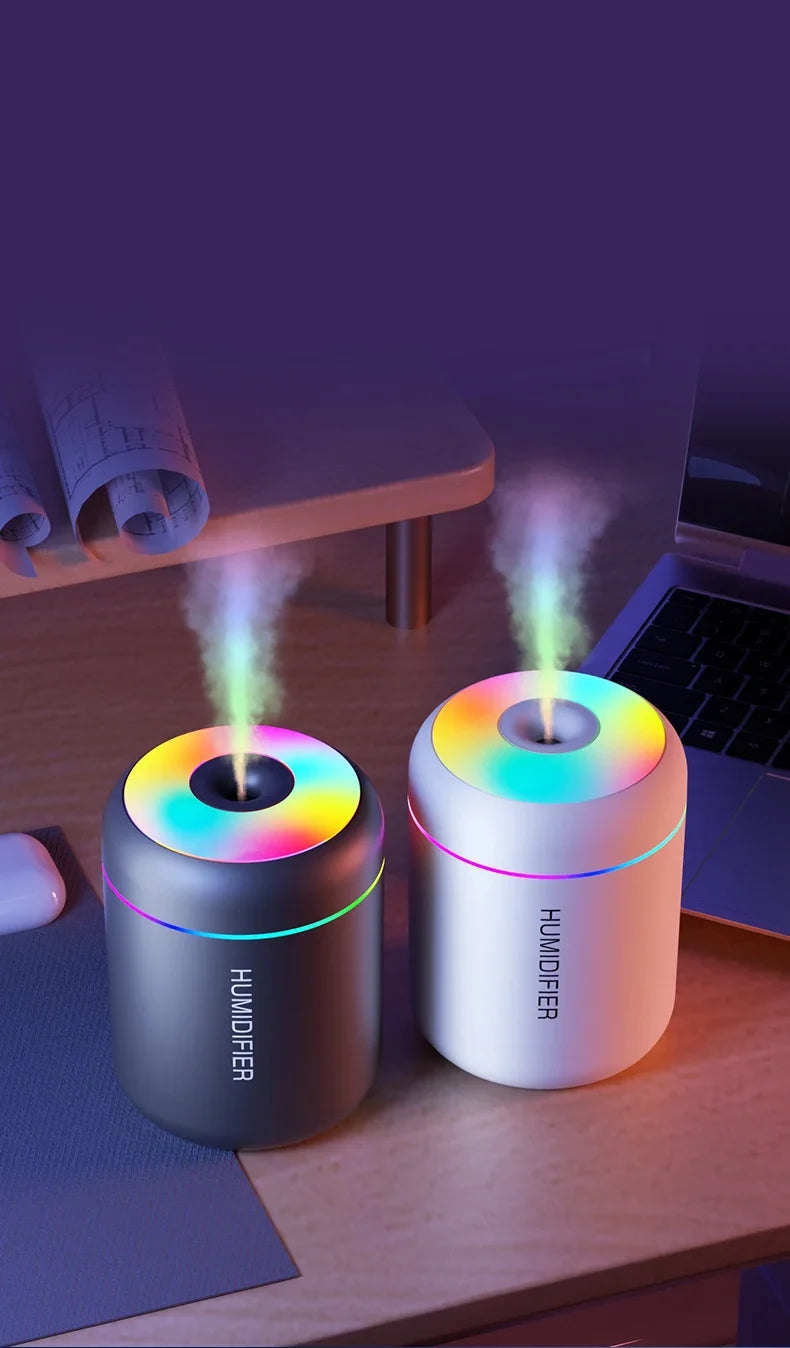 LAQTA 180ML mini air humidifier emitting a gentle mist, compact design ideal for small spaces and personal use.