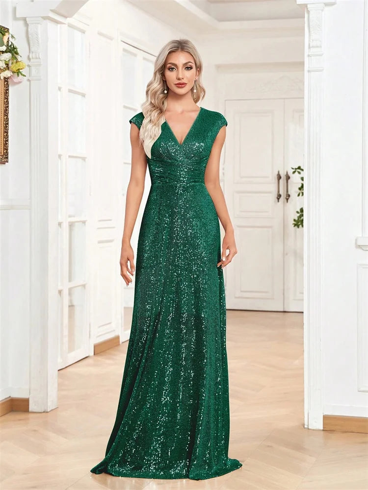 Elegant V-neck mermaid evening dress by LAQTA, showcasing a fitted silhouette and flowing fabric in a formal setting.