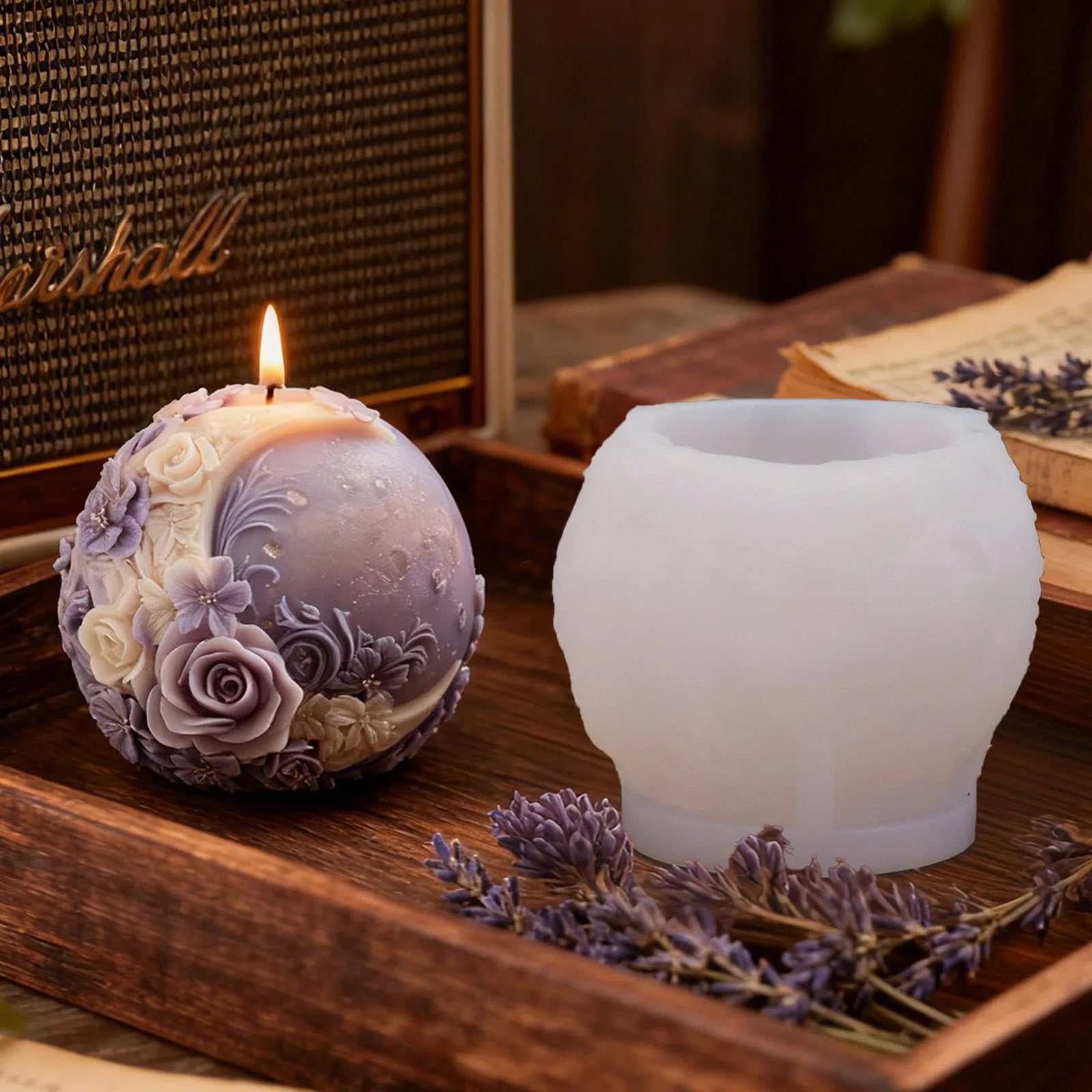 Silicone mold for floral moon-shaped spherical candles by LAQTA, showcasing intricate flower designs and smooth mold surface.
